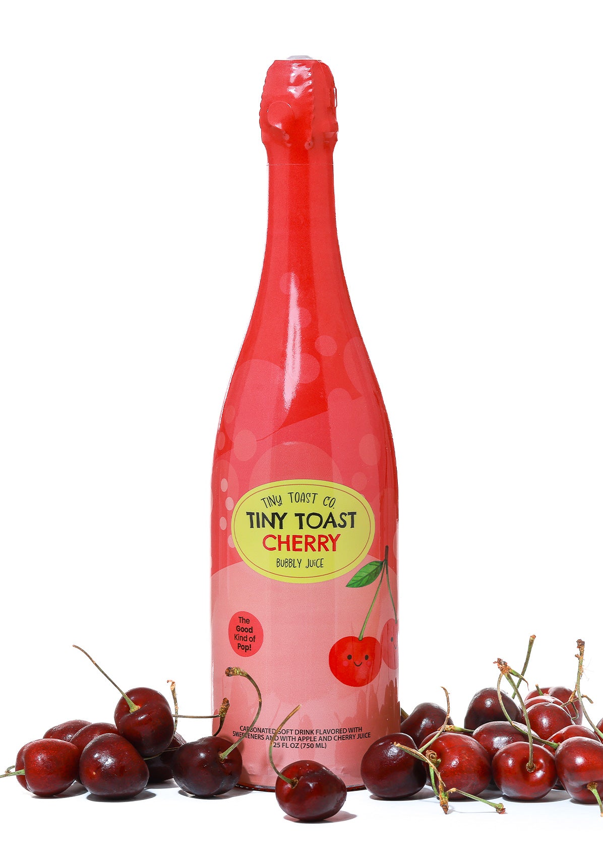 A bottle of Tiny Toast Co. Cherry Bubbly Juice sparkling drink, styled with fresh red cherries on a white background.